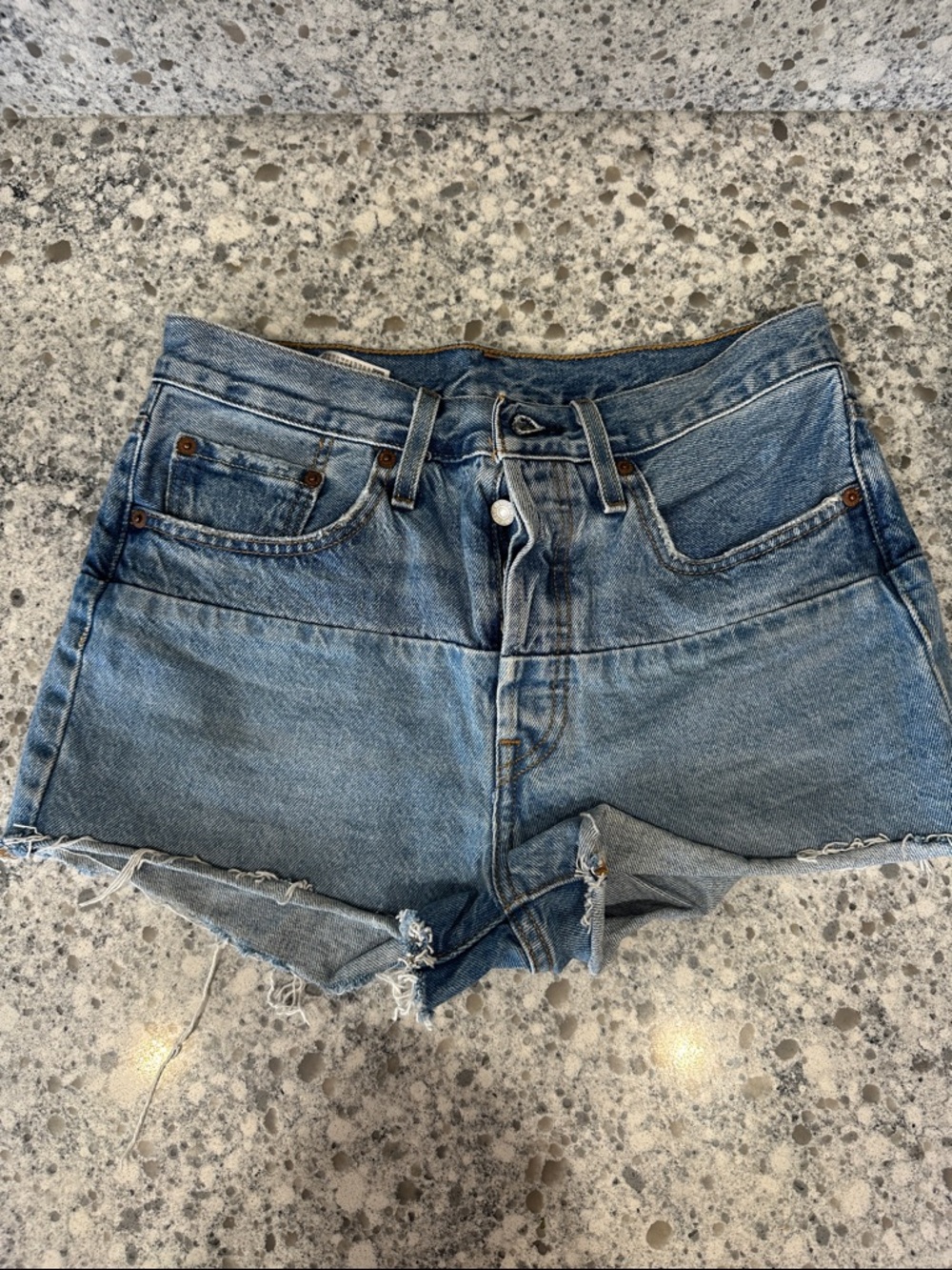 Levi's Light Blue Cutoff Denim Shorts with Frayed Hem